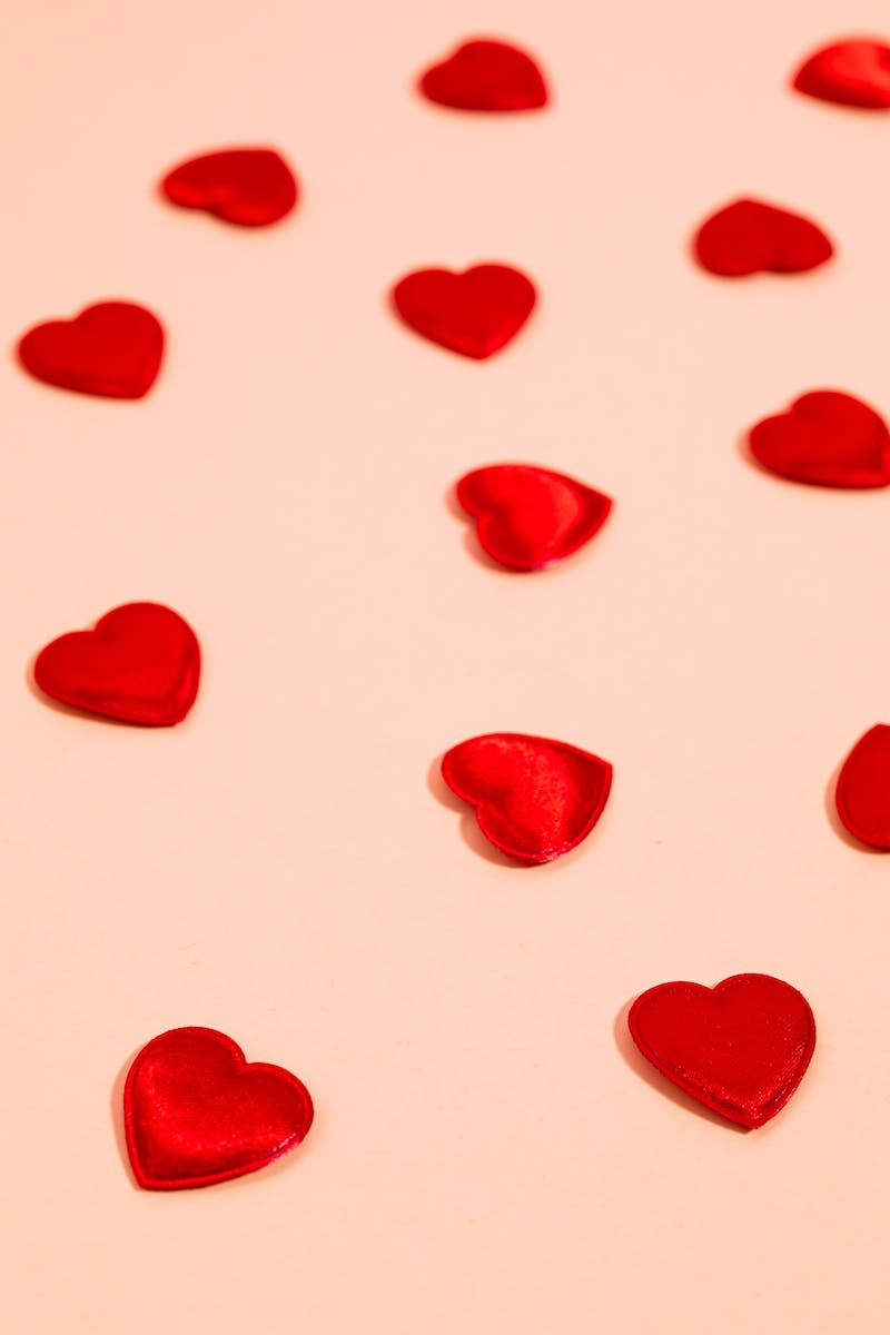 Red Hearts Against Yellow Background
