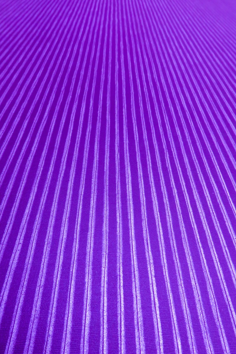 a close up of a purple background with lines