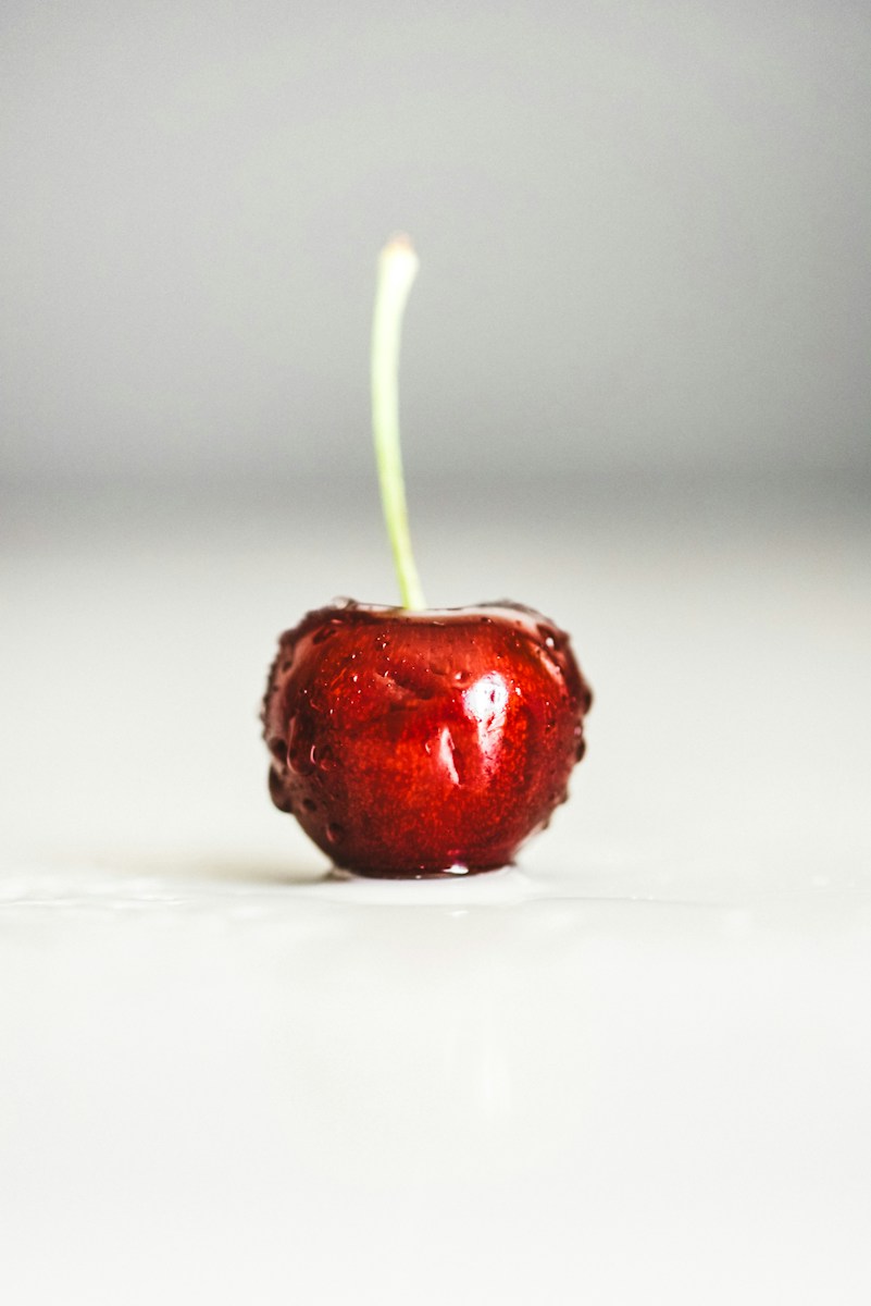 red cherry fruit on white background