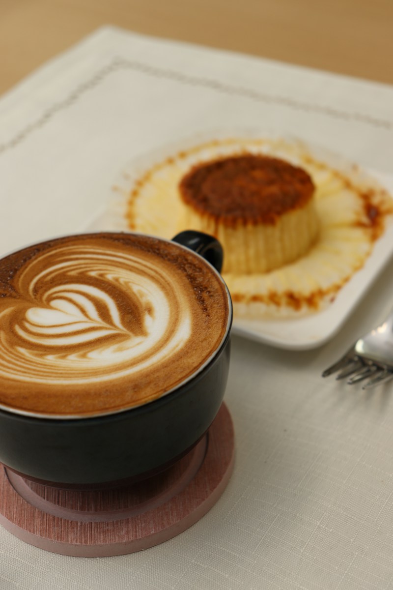 coffee beside cupcake