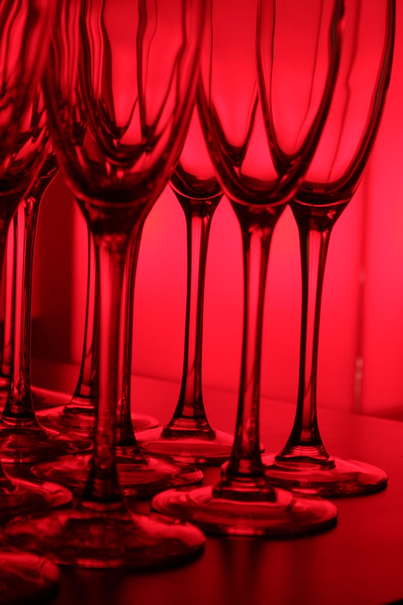 red wine glass in close up photography