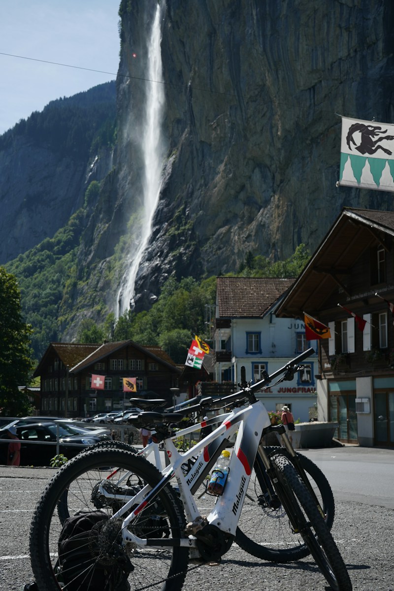 a mountain with a waterfall in the background
