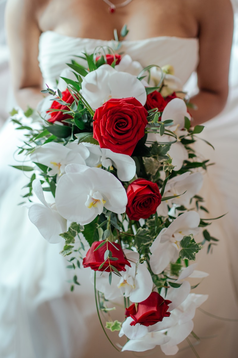 red rose and white orchid bouquet