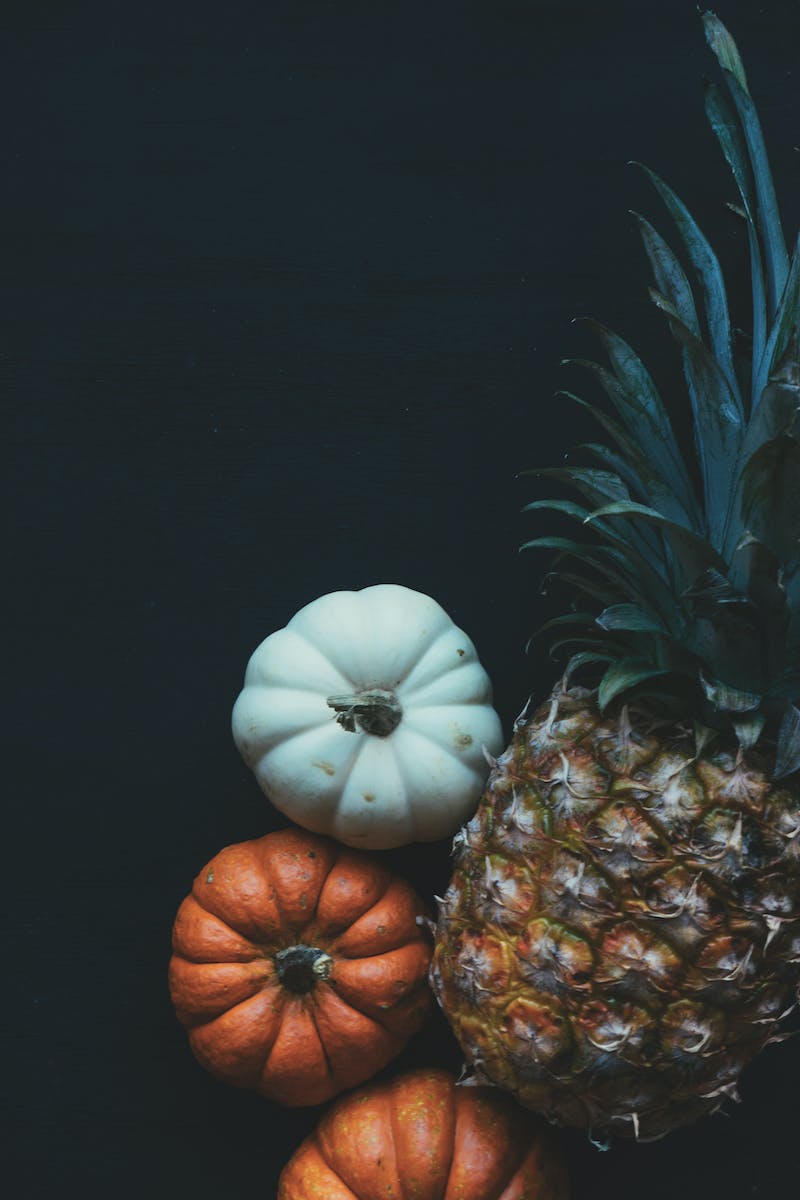 Pineapple Beside Pumpkin