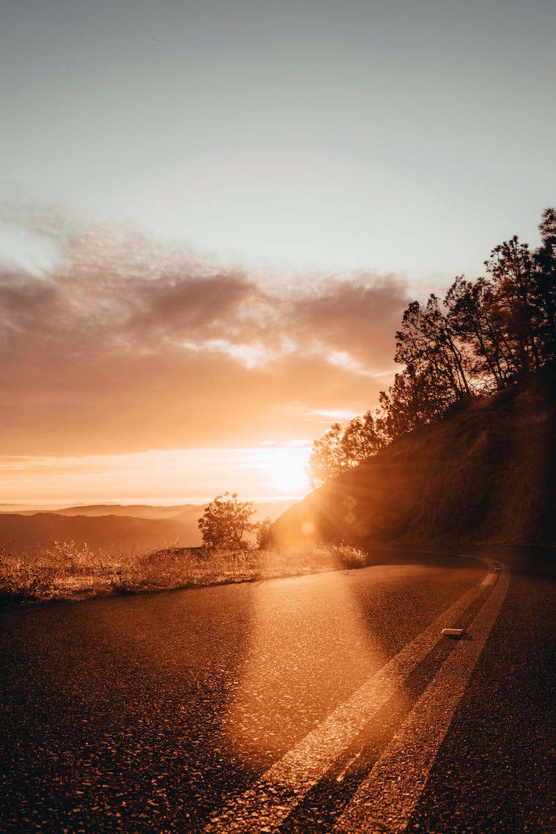 Photo Of An Empty Road During Dawn