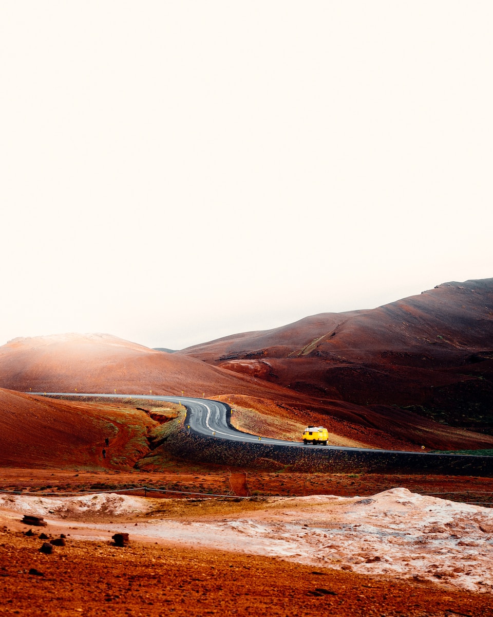 brown mountains near road during daytime