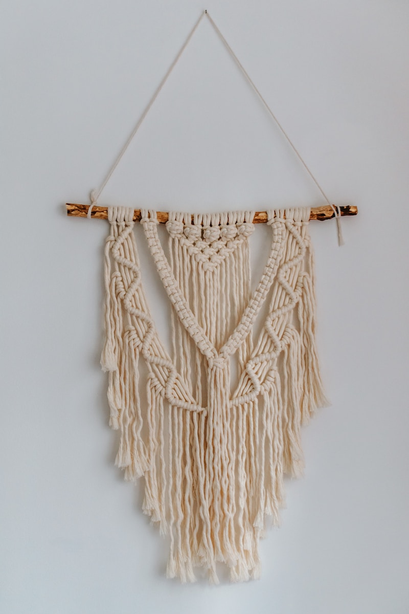 brown rope on white wall
